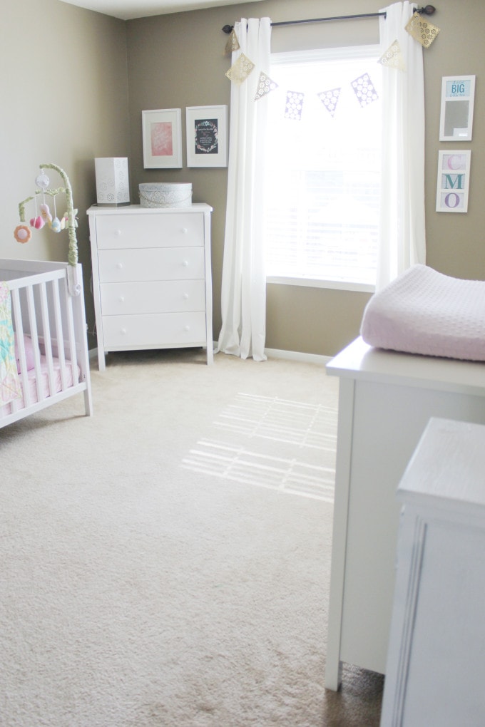 Neutral nursery with pops of color, ikea furniture, etsy quilt, pinterest prints, budget friendly