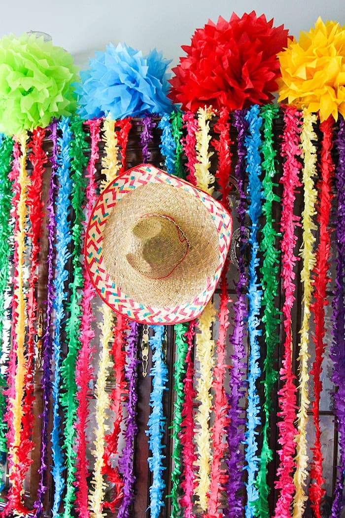 Make a wall out of tissue festooning - great party decor idea!