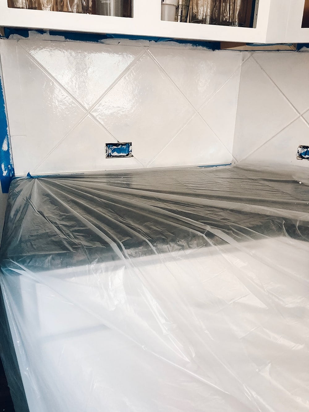 Houston blogger Meg O. on the Go shares how she painted her tile backsplash