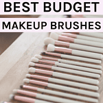 Best Budget Makeup Brushes for beginners - A collection of neatly arranged makeup brushes with soft white bristles and rose gold handles on a wooden surface.
